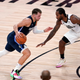 Illustration for article titled Exclusive: Photos of the Los Angeles Clippers Guarding Luka Doncic During Sunday's Overtime Thriller